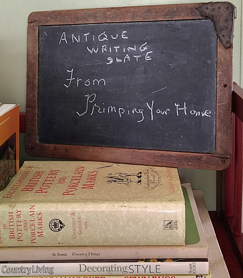 Antique Blackboard `Pine Framed Writing Slate sitting on book case
