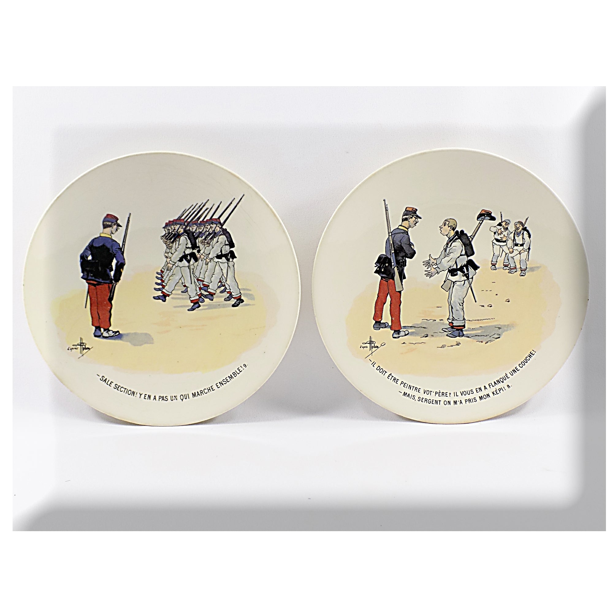 Two decorative plates with vintage-style illustrations of men in military uniforms on a white background.