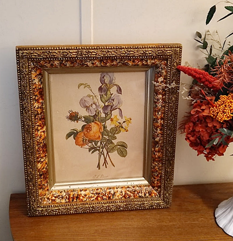 Faux Tortoise and Gilt Antique Picture Frame on table with flowers