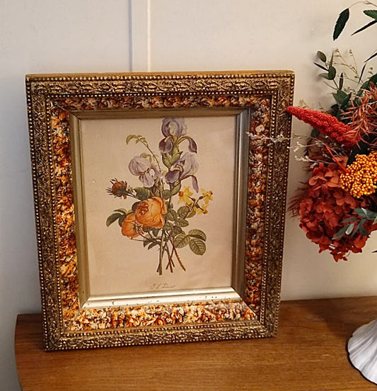 Faux Tortoise and Gilt Antique Picture Frame on table with flowers