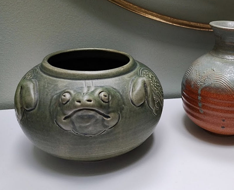 Green Frog Art Pottery Bowl on hutch