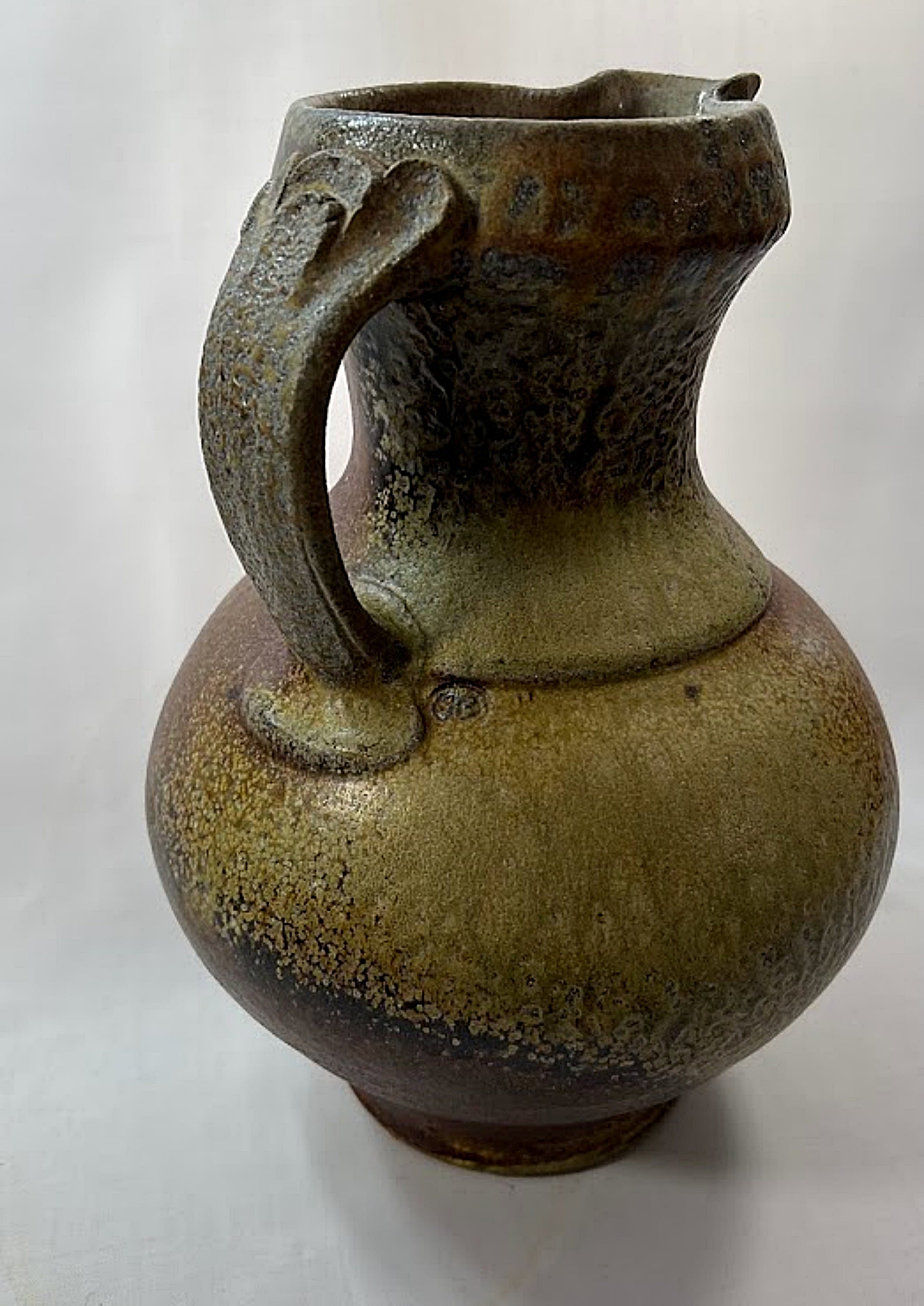 Vintage Studio Pottery Pitcher Salt and Ash Glazes Artist Monogrammed green side view with handle