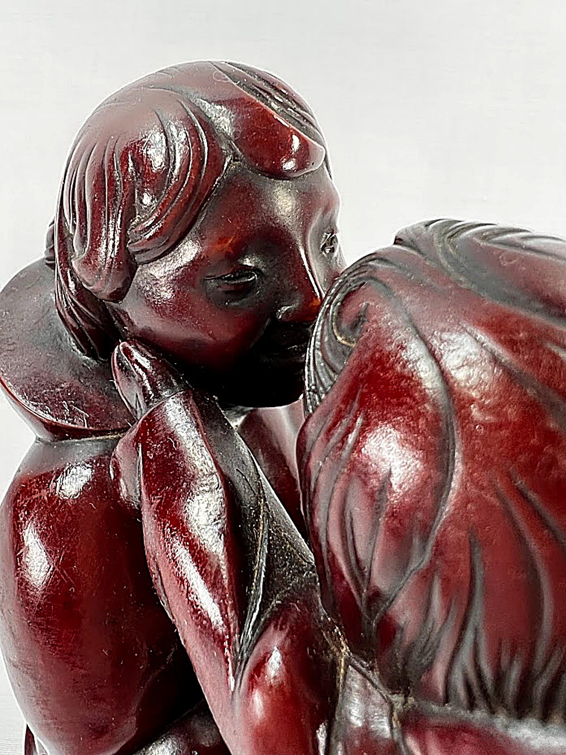 Inuit Mother and Child Sculpture by Thomas McPhee child closeup