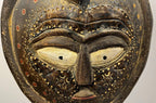 African Carved Figure with Snake