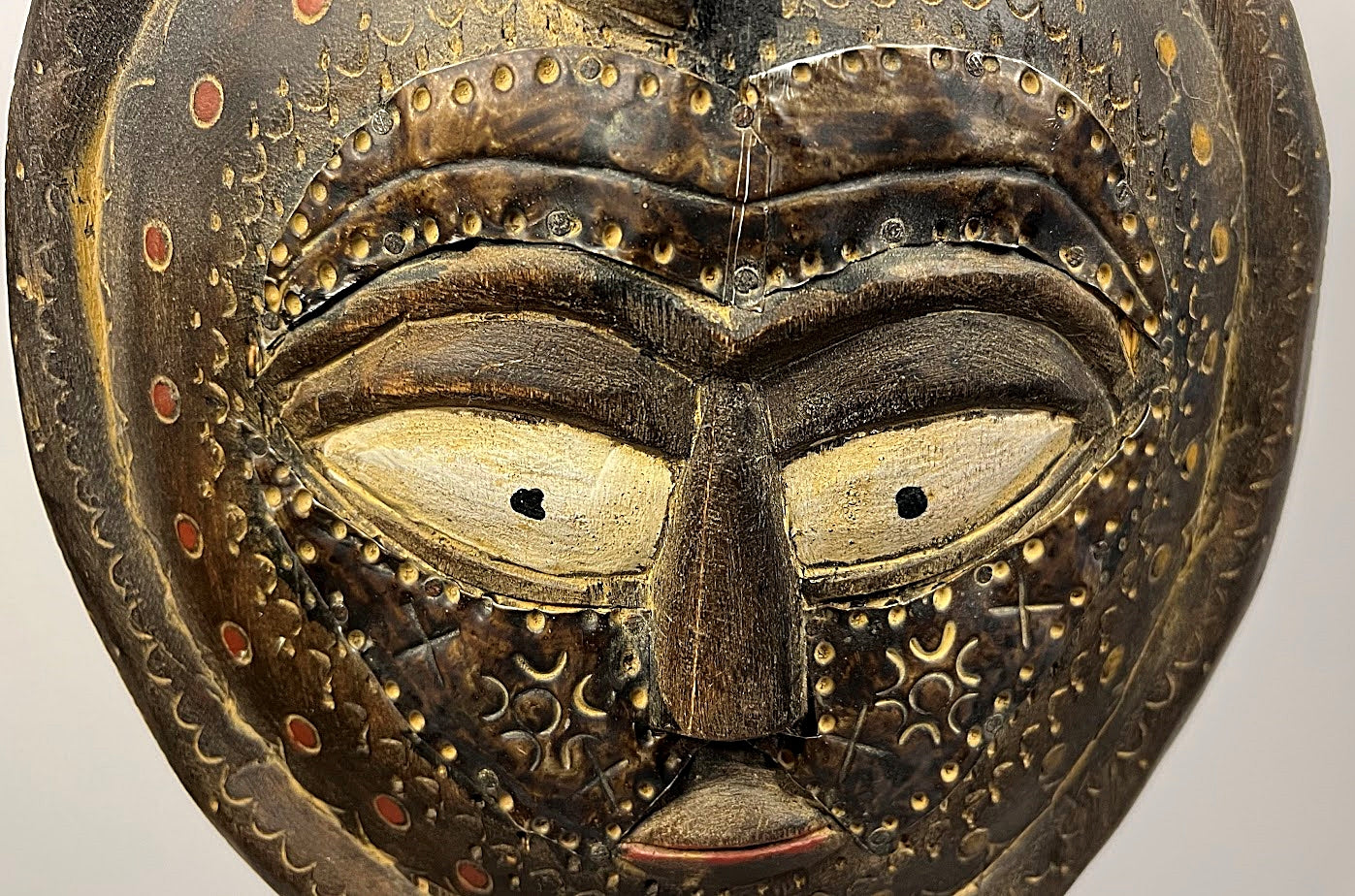 African Carved Figure with Snake