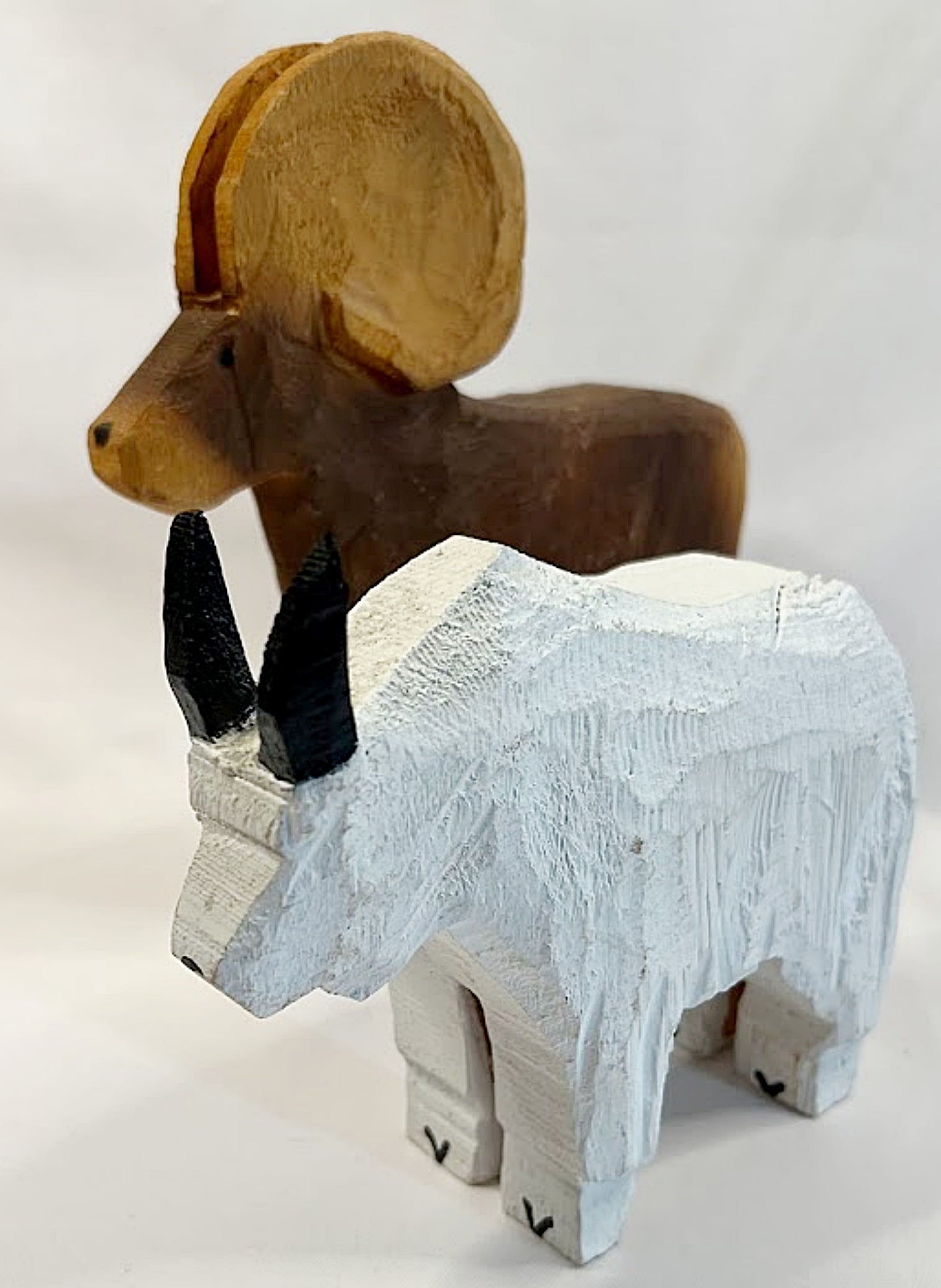 Folk Art Goat and Sheep Chain Saw Carvings