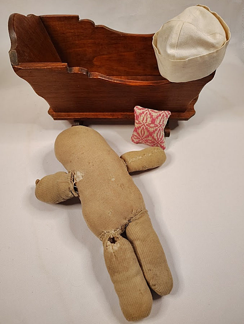 1920s Cloth Doll with Pine Cradle showing doll damage