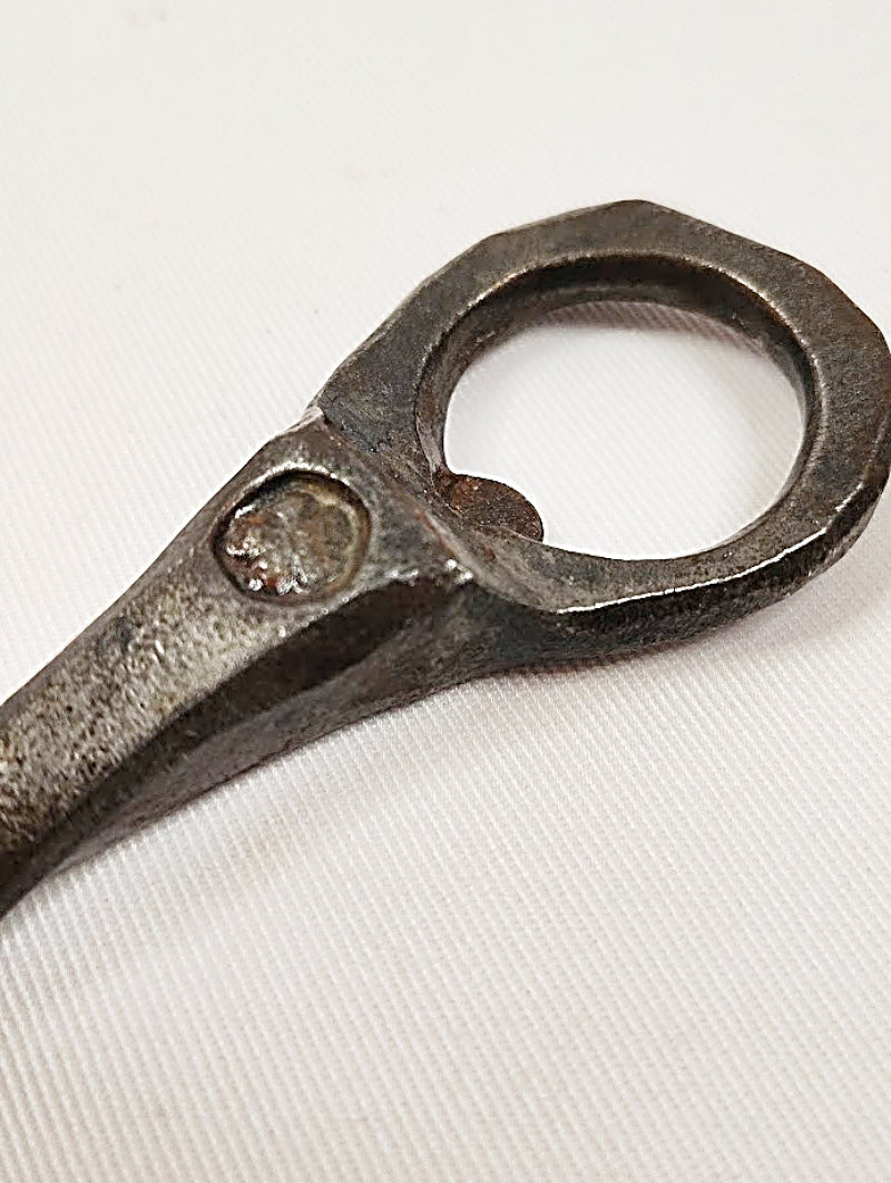 Folk Art Crow's Head Bottle and Can Opener Church Key clover closeup