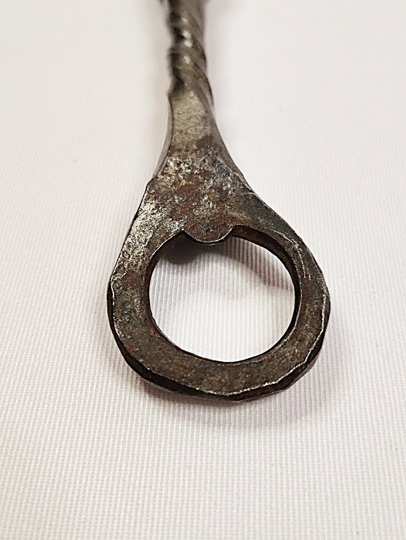 Folk Art Crow's Head Bottle and Can Opener Church Key cap opener closeup