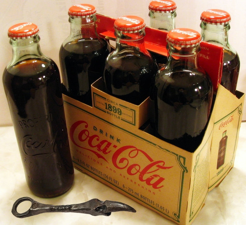 Folk Art Crow's Head Bottle and Can Opener Church Key with antique coca-cola