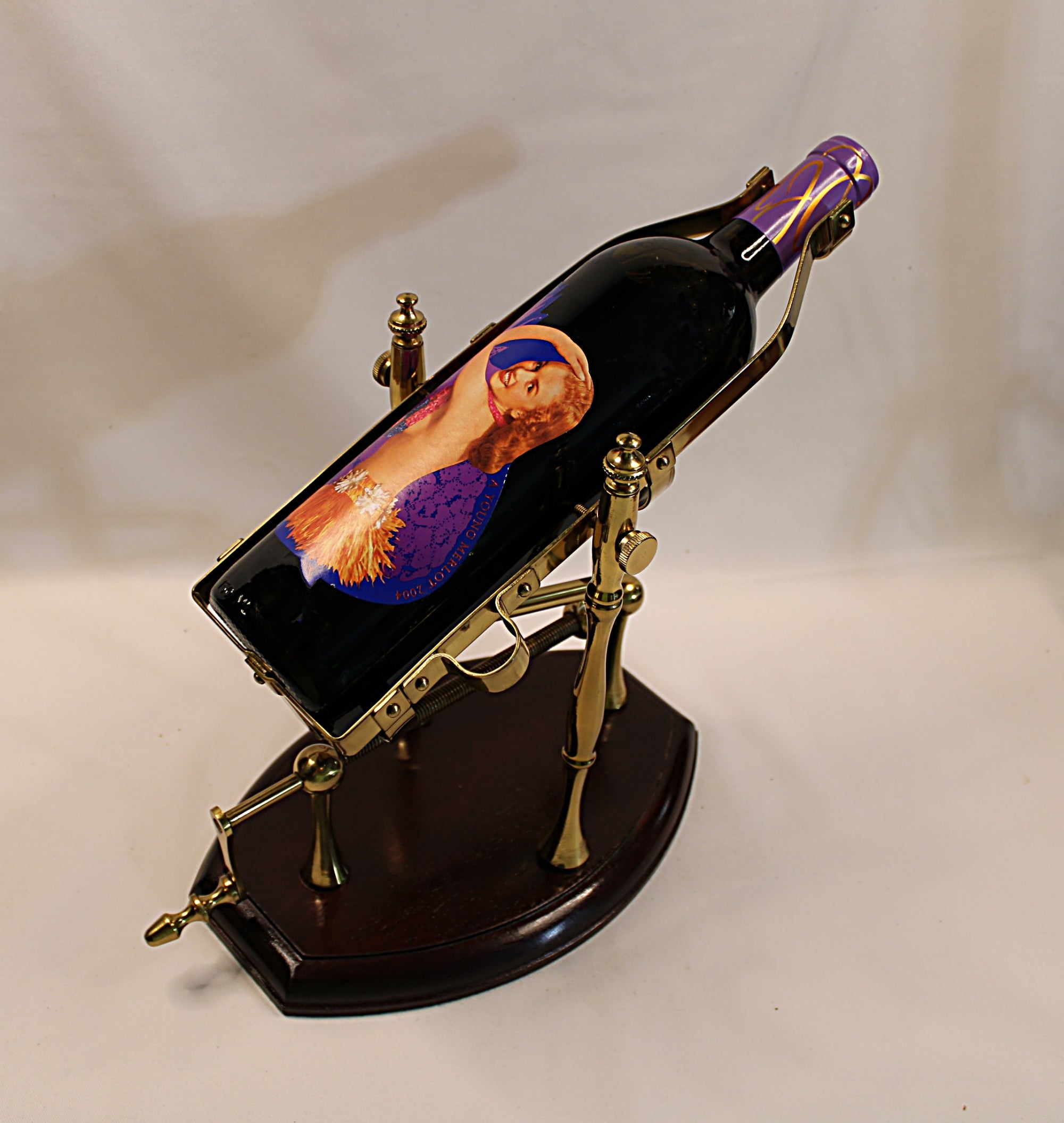 Marilyn Monroe wine bottle in a vintage wine decating holder