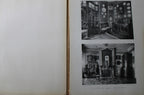 Antique French Folio Book Titled Interieurs Rustiques Paris 1926
An open vintage book or album showing an aged blank left page and a right page with two black-and-white photographs of an ornate interior room with mirrors, cabinets, and decorative wall elements.