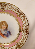 Decorative plate with a portrait of a young boy on a pink background Right Rim