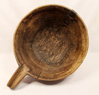 Make-Do Repair Early American Treen Primitive Hand Carved Wood Bowl  tipped with handle down left front.