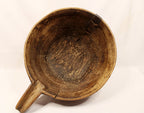 Make-Do Repair Early American Treen Primitive Hand Carved Wood Bowl  tipped showing full inside view.