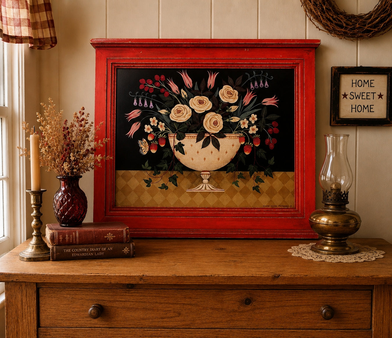 Decorative painting in a red frame on a wooden dresser with books and a lamp.Folk Art Massachusetts Artist Diane Ulmer Pedersen Framed Print