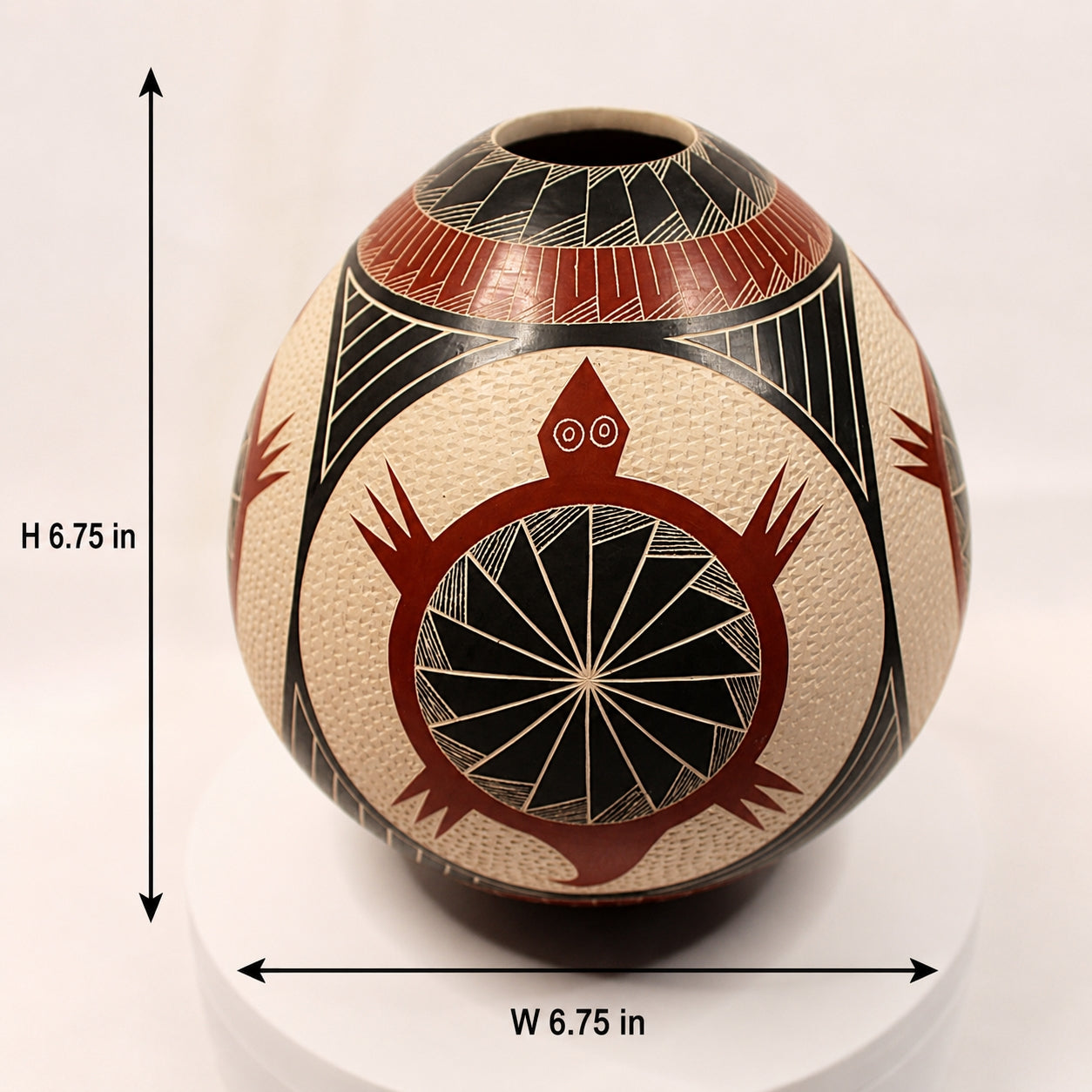 A decorative ceramic vase with a hand-painted geometric and animal-inspired pattern, shown with dimension arrows and text indicating a height of 6.75 inches and width of 6.