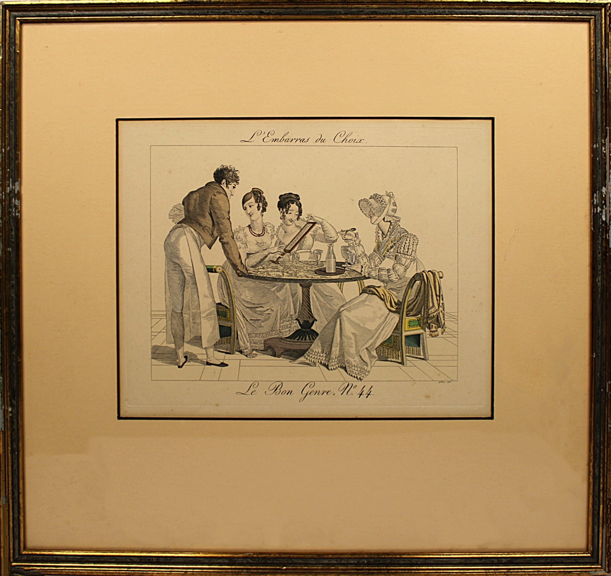 Framed artwork depicting a scene with people around a table on a beige background