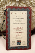 Certificate with decorative border and text on a textured surface