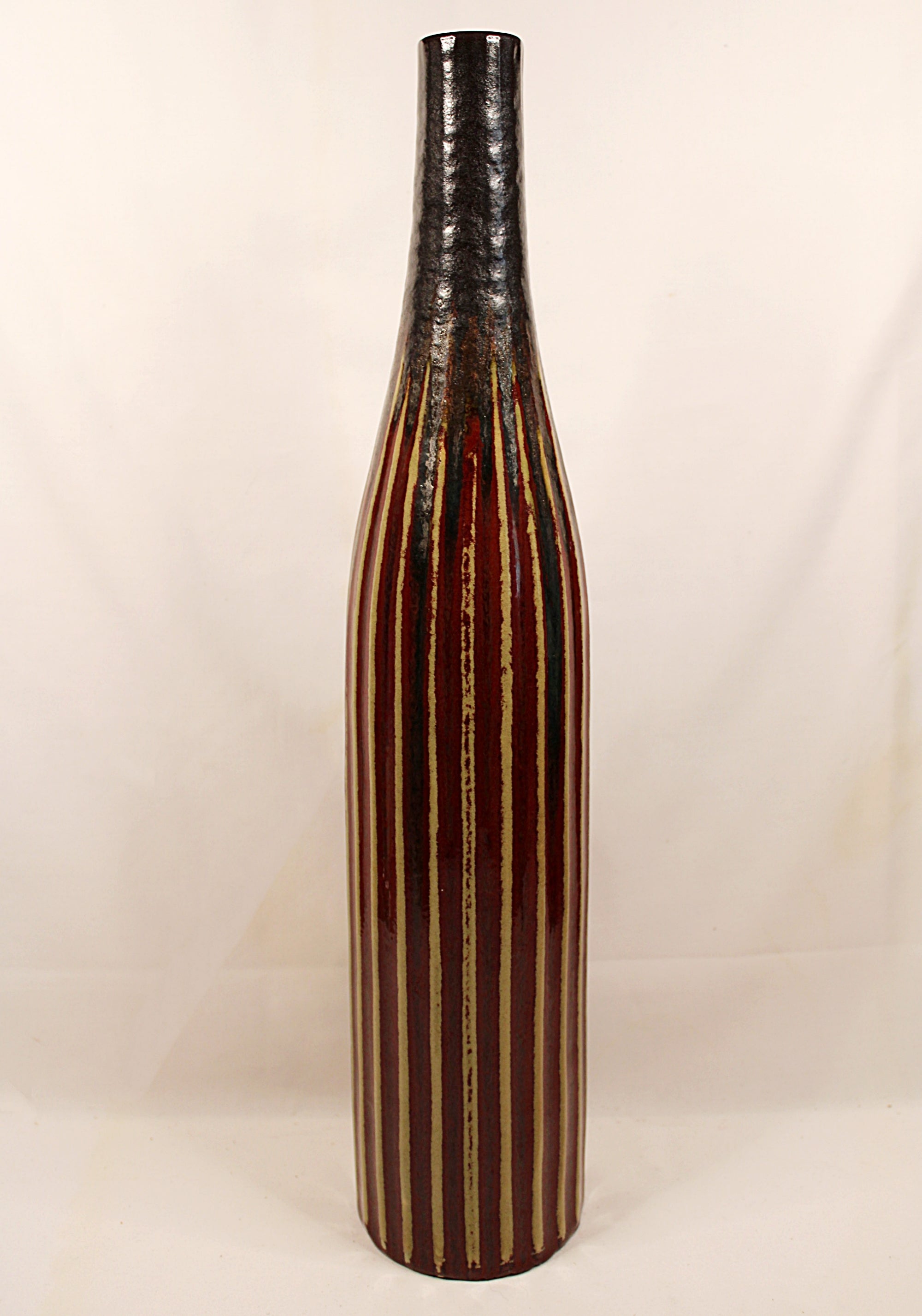 Decorative Tessuto Vase with striped pattern on a white background