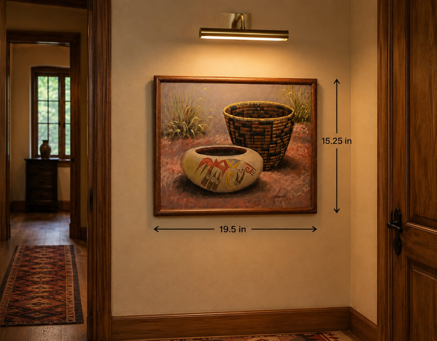 A framed wall art painting showing a rustic basket and a small decorative bowl, displayed in a hallway with dimension arrows and labels indicating 19.5 in width and 15. by Yellowhair